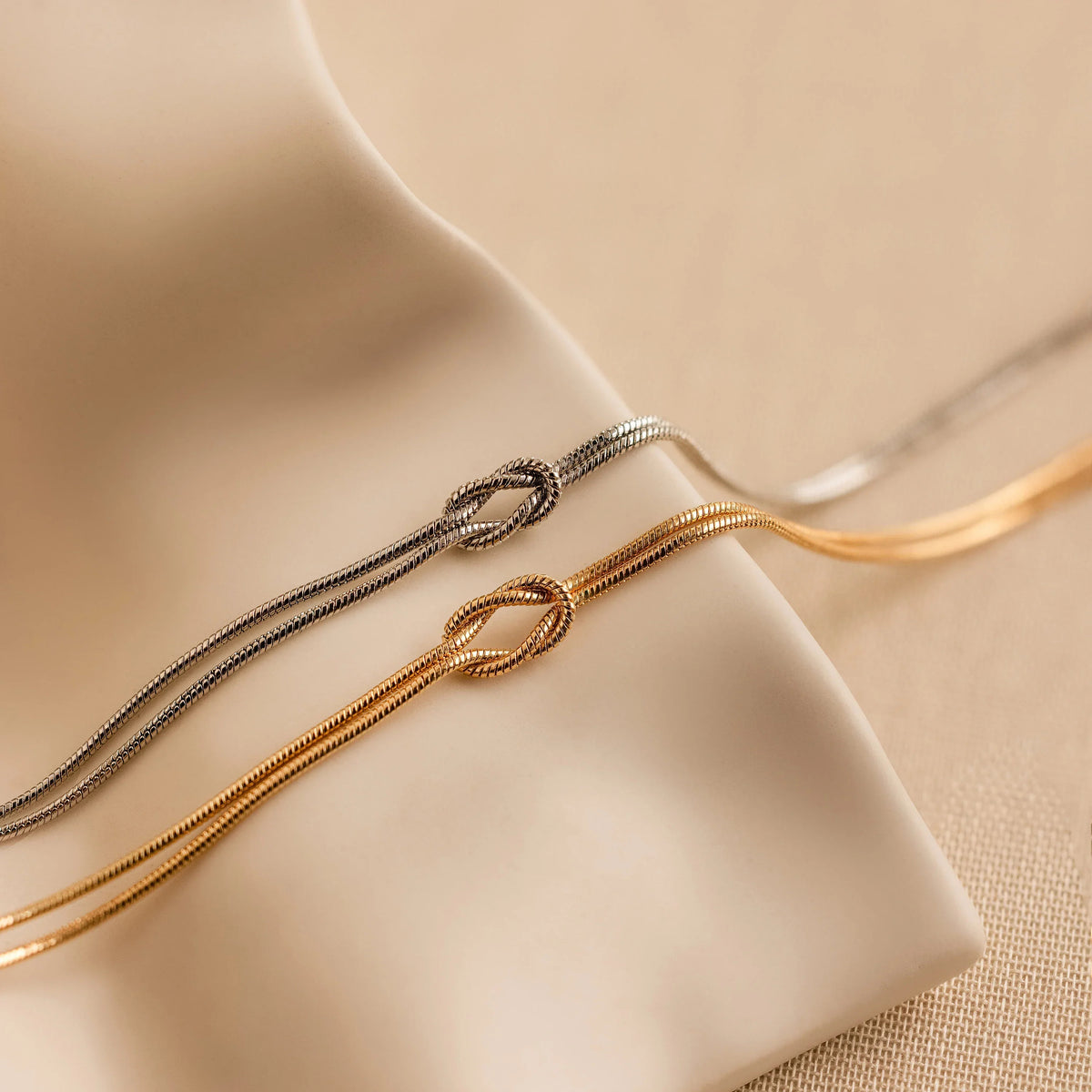 Pulseira Nó Infinito Banhado a Ouro 18k - Compre 1 Leve 2