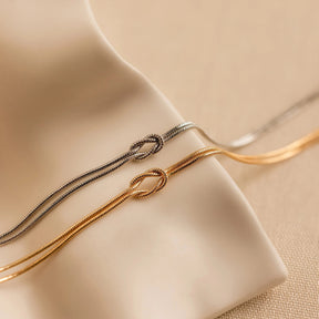 Pulseira Nó Infinito Banhado a Ouro 18k - Compre 1 Leve 2